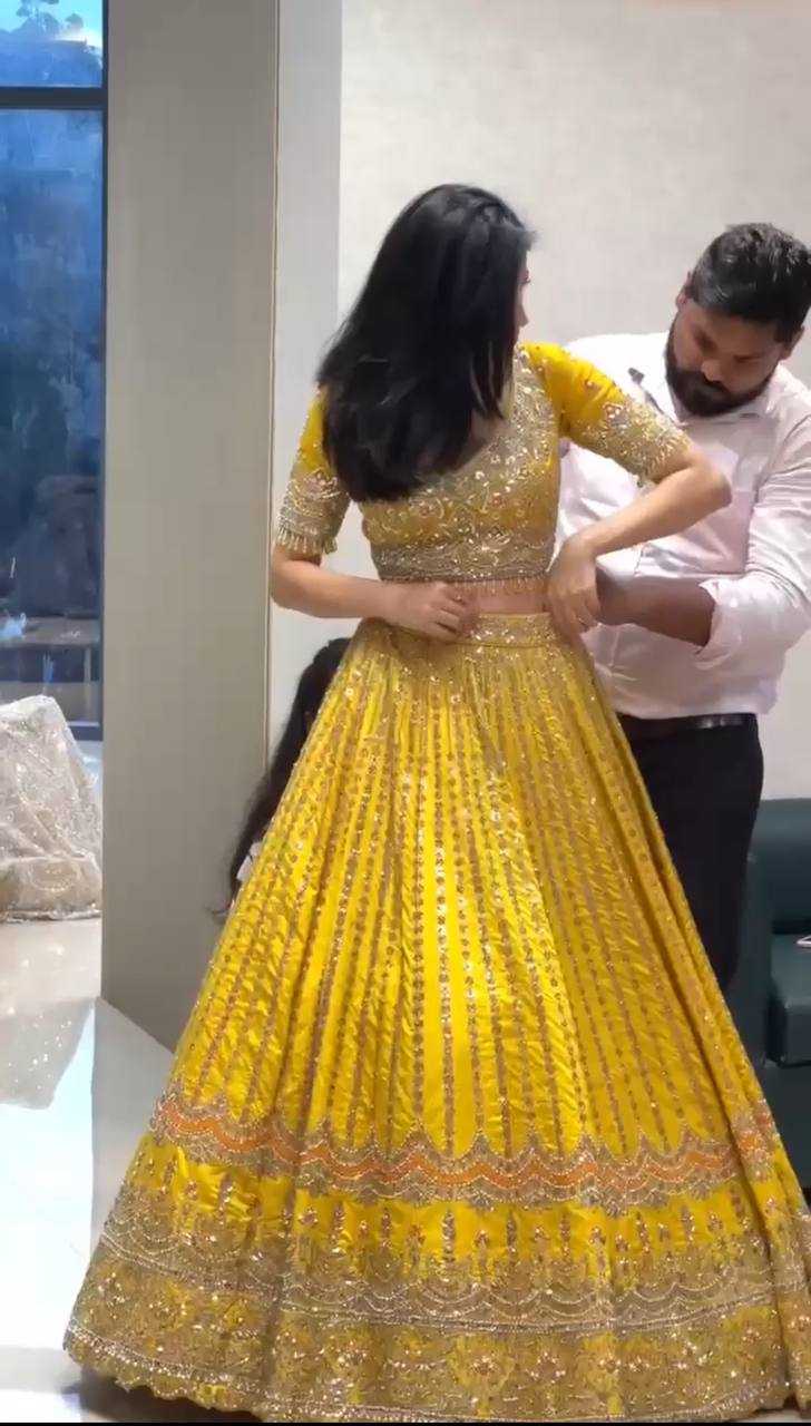 YNF FAUX GEORGETTE RIN108 1680 LEHENGAS WHOLESALE DESIGNER YELLOW BRIDAL HALDI LEHENGAS MANUFACTURER