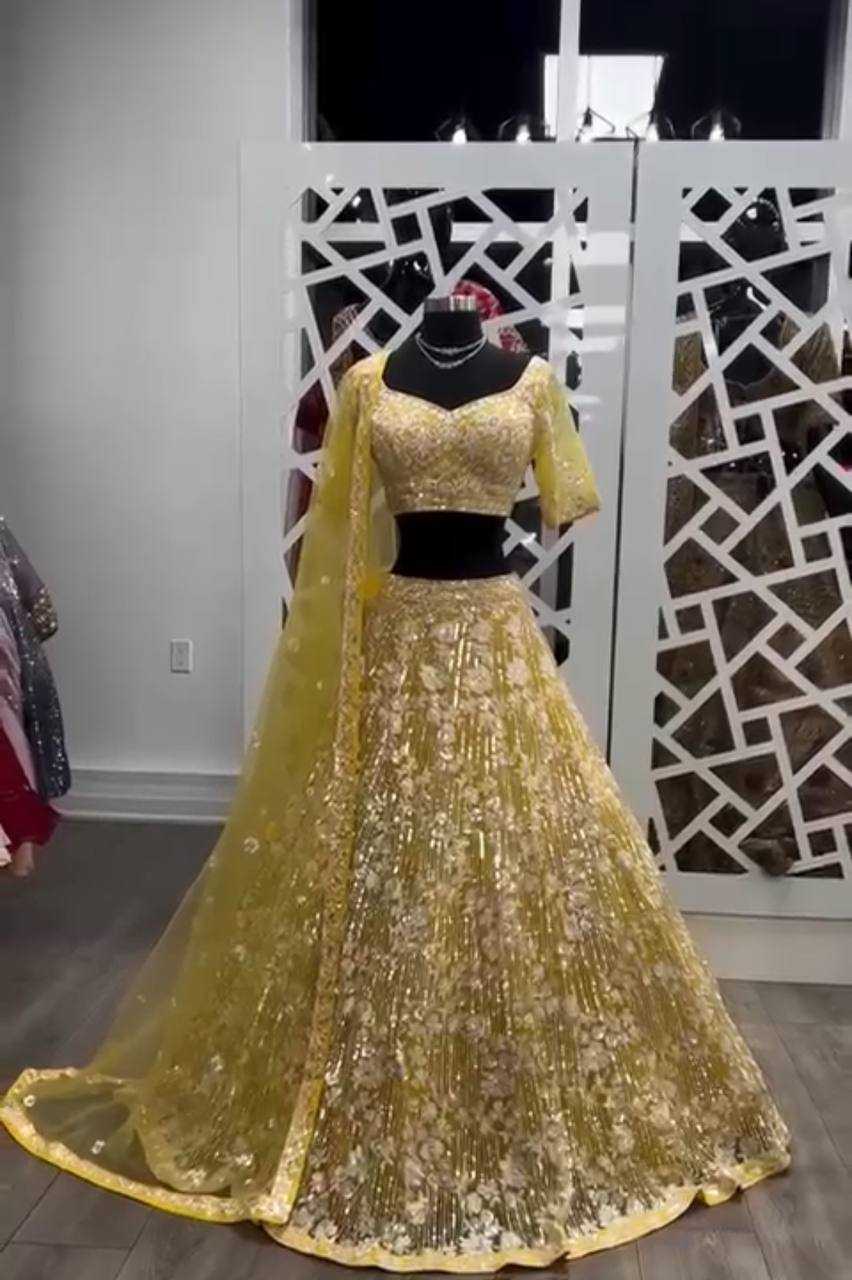 YNF BUTTERFLY NET RIN108 1694 LEHENGAS WHOLESALE BIRIDAL DESIGNER YELLOW HALDI OUTFITS LEHENGAS MANUFACTURER - Deevit International