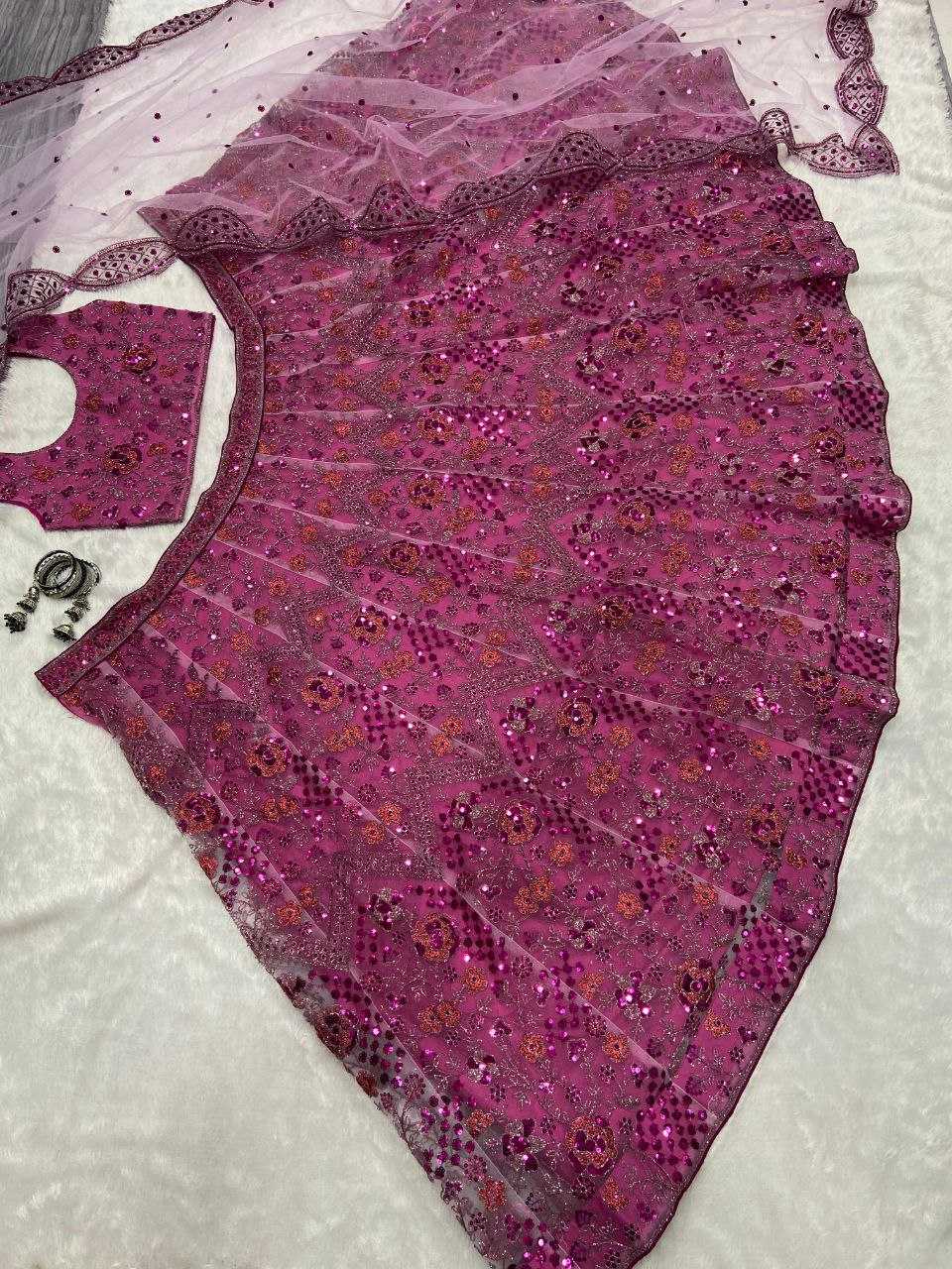 YNF BUTTERFLY NET RIN121 1002 LEHENGAS WHOLESALE EMBROIDERED DESIGNER NET FANCY SEQUNIS PINK LEHENGAS MANUFACTURER - Deevit International