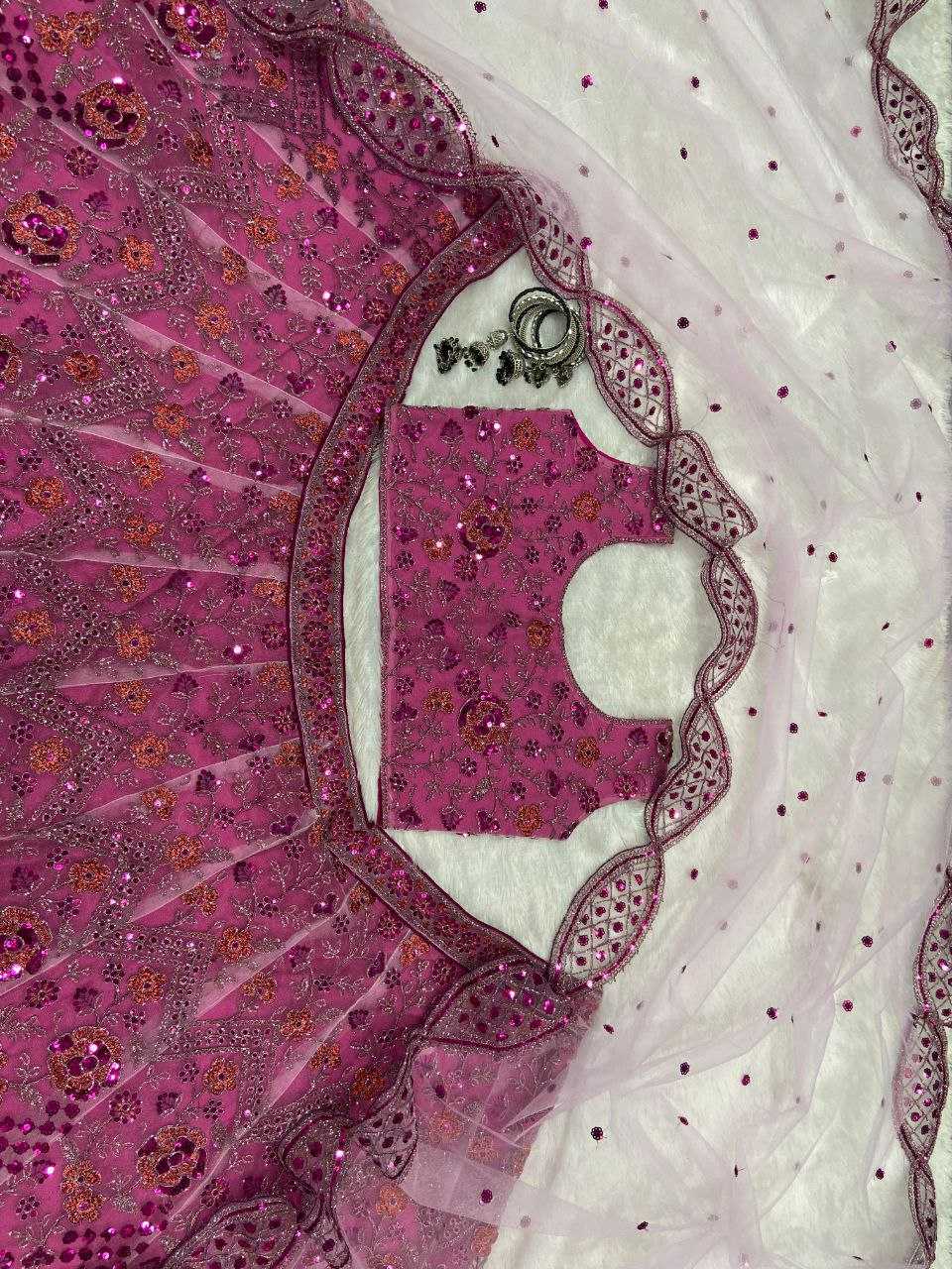 YNF BUTTERFLY NET RIN121 1002 LEHENGAS WHOLESALE EMBROIDERED DESIGNER NET FANCY SEQUNIS PINK LEHENGAS MANUFACTURER - Deevit International