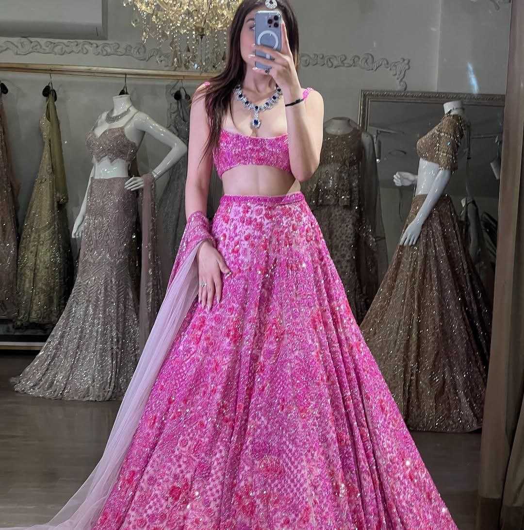 YNF BUTTERFLY NET RIN121 1002 LEHENGAS WHOLESALE EMBROIDERED DESIGNER NET FANCY SEQUNIS PINK LEHENGAS MANUFACTURER - Deevit International