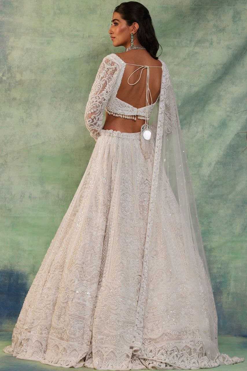 YNF GEORGETTE RIN121 1007 LEHENGAS WHOLESALE WEDDING DESIGNER EMBROIDERED NET FANCH SEQUNIS WHITE LEHENGAS MANUFACTURER - Deevit International