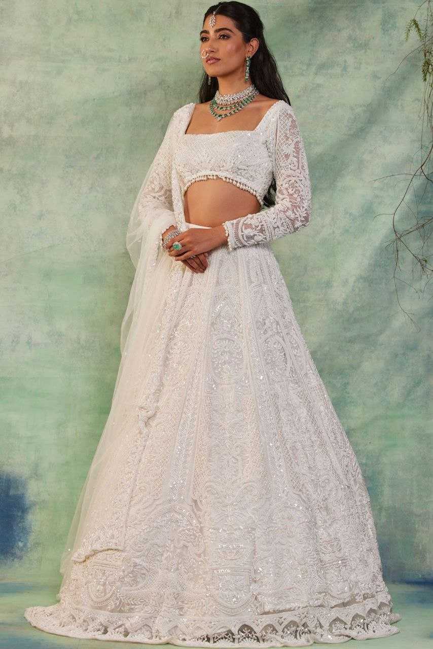 YNF GEORGETTE RIN121 1007 LEHENGAS WHOLESALE WEDDING DESIGNER EMBROIDERED NET FANCH SEQUNIS WHITE LEHENGAS MANUFACTURER - Deevit International