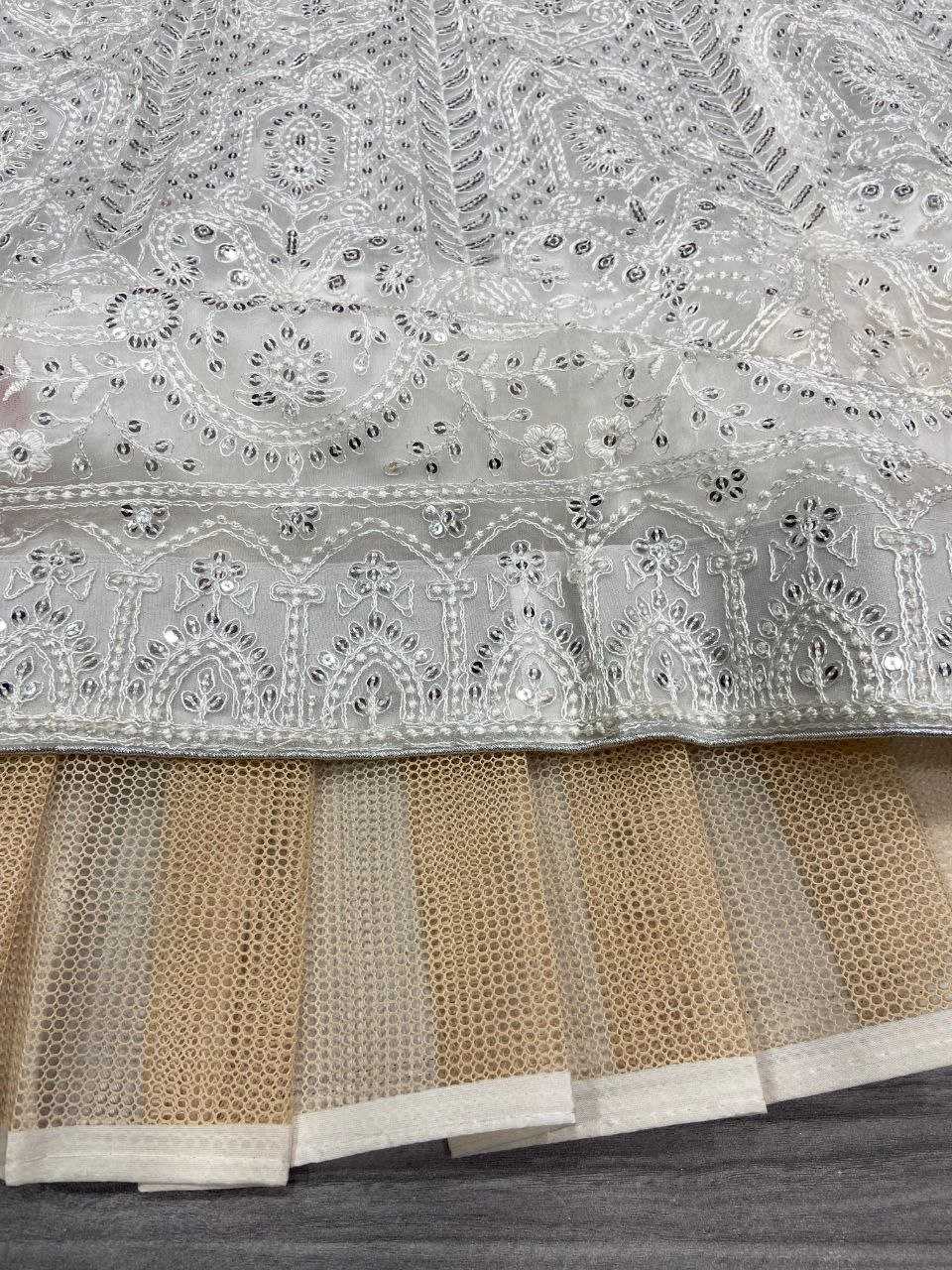 YNF GEORGETTE RIN121 1007 LEHENGAS WHOLESALE WEDDING DESIGNER EMBROIDERED NET FANCH SEQUNIS WHITE LEHENGAS MANUFACTURER - Deevit International